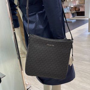 Michael Kors Bags | Michael Kors Jet Set Travel Large Messenger Crossbody Black | Color: Black/Cream | Size: Os | Pursehub's Closet